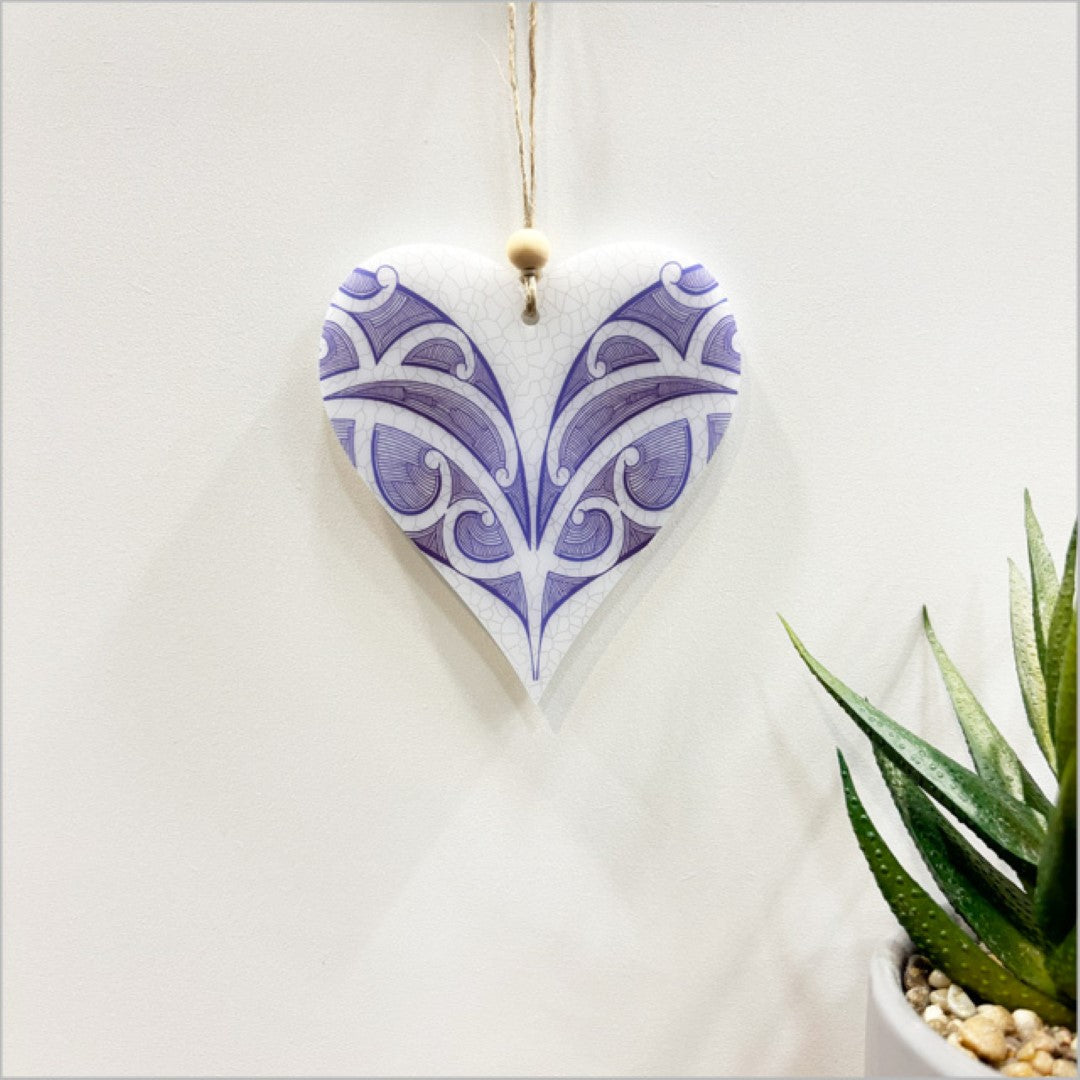 Heart-shaped hanging ornament in satin acrylic, vibrant design, perfect for home decor or as a thoughtful gift.