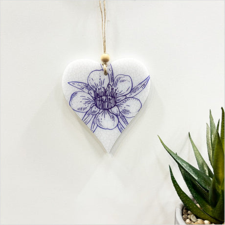 Satin acrylic hanging ornament featuring a printed heart design, pre-strung and perfect for home decor and gifting.