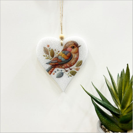 Beautifully crafted hanging ornament of a heart bird with closed wings, made from premium satin acrylic, perfect for decor.