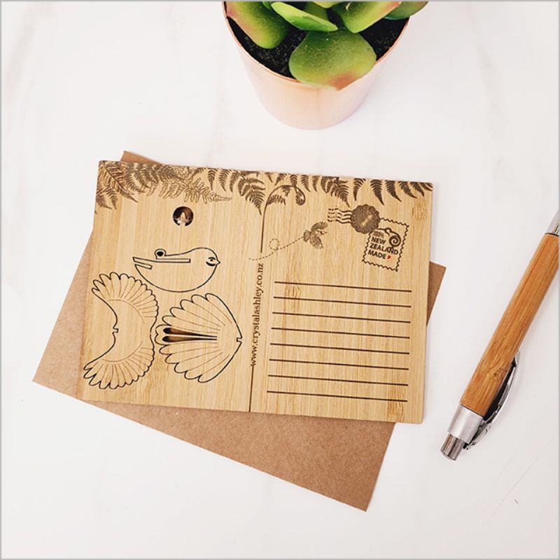 Eco-friendly bamboo postcard featuring a detachable Fantail 3D ornament, elegant and sustainable for special occasions.