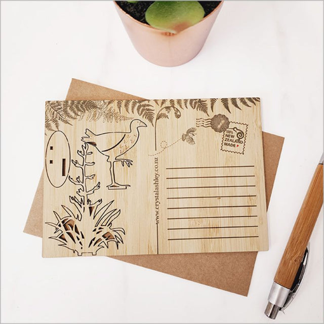 Eco-friendly bamboo postcard with 3D Pukeko design on flax, perfect for heartfelt messages or home decor.