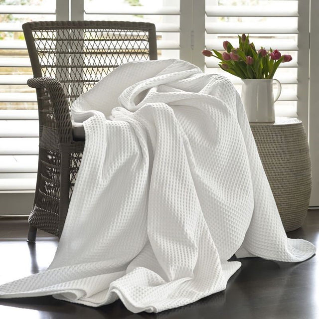 Baksana's Artemis Waffle Blanket in white, 240x260cm, made of 100% cotton, perfect for beds or sofas.