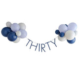 Navy and gold balloon bunting for 30th birthday celebrations, durable and stylish, perfect for indoor or outdoor parties.