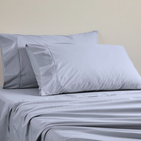 Queen Sheet Set in Denim, crafted from breathable cotton with a crisp finish for a stylish and comfortable sleep experience.