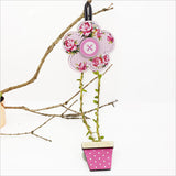 Daisy Pink hair clip tidy organizer, 480mm tall, 130mm diameter, charming design for neat storage of hair accessories.