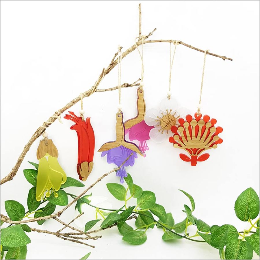 Kowhai flower hanging ornament in bamboo and yellow satin acrylic, perfect for home decor or gifting.