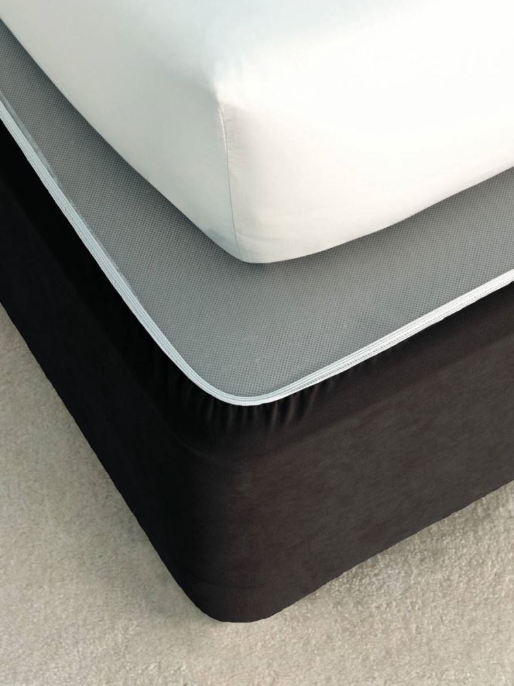 Sleek black faux suede double bedwrap with adjustable edges for a polished bedroom look.