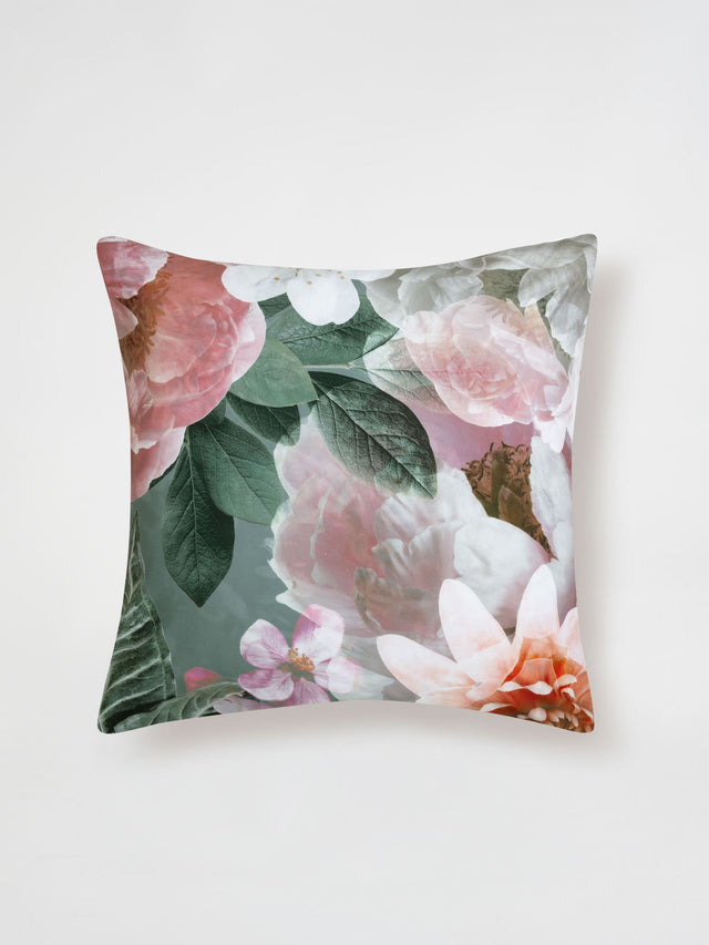 Blush European pillowcase with large mauve and pink florals on a green background, crafted from soft cotton sateen.