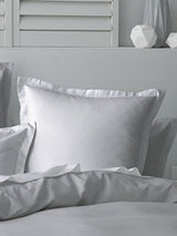Nova Silver Duvet Set featuring a textured design, 100% cotton, waffle front, and tailored flange for elegance and comfort.