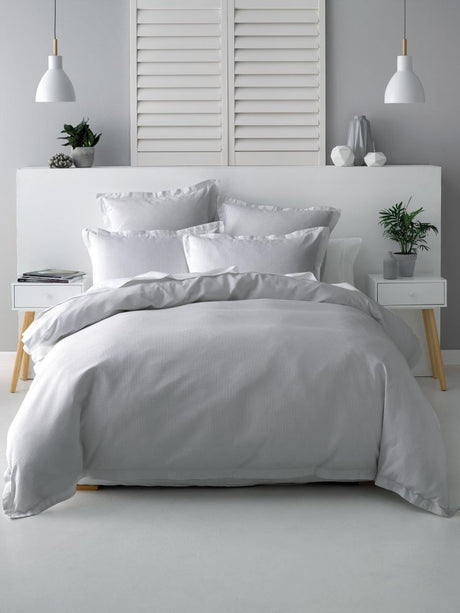 Elegant silver Californian King duvet cover set with cotton waffle front and percale reverse for luxurious comfort.