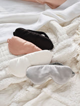 Blush silk sleep mask by Savona, designed for comfort, light-blocking, and preventing eye area creases.