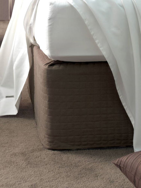 Chocolate suede quilted bedwrap for single beds, concealing bed bases with elegant style and durability.