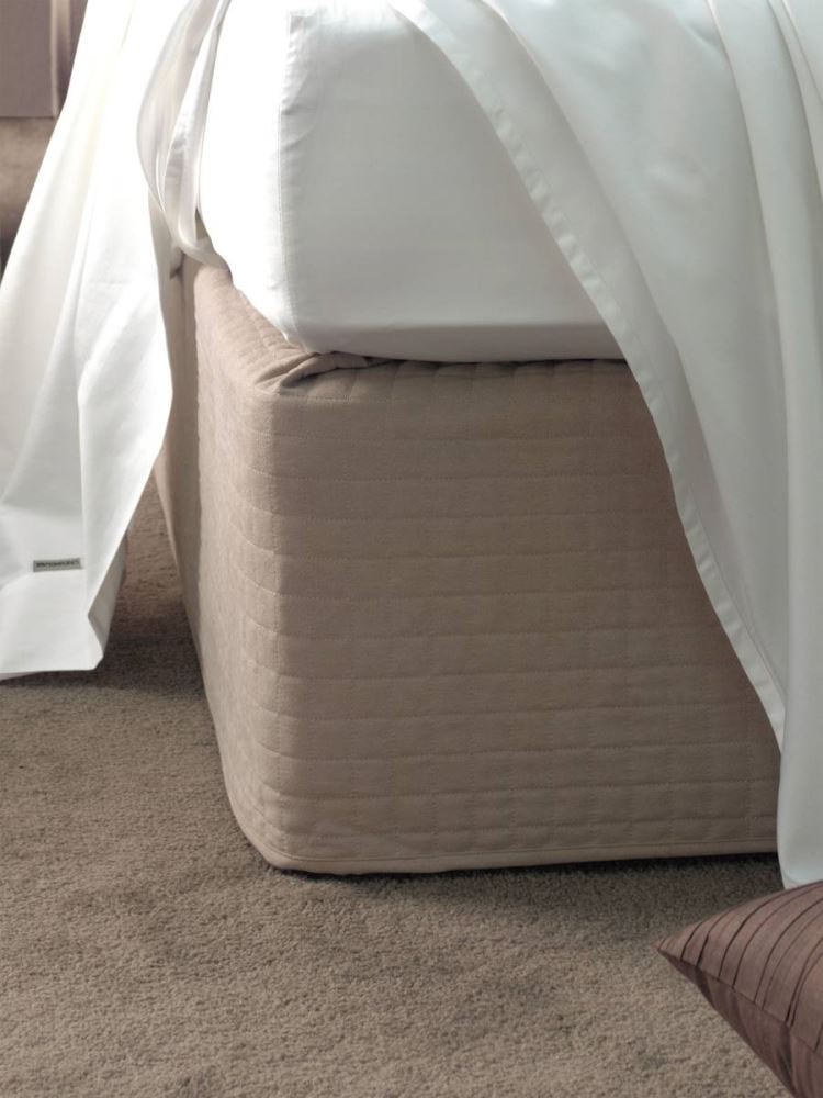 Luxurious quilted suede bedwrap for Super King beds, enhancing decor while concealing bed bases, easy to fit.