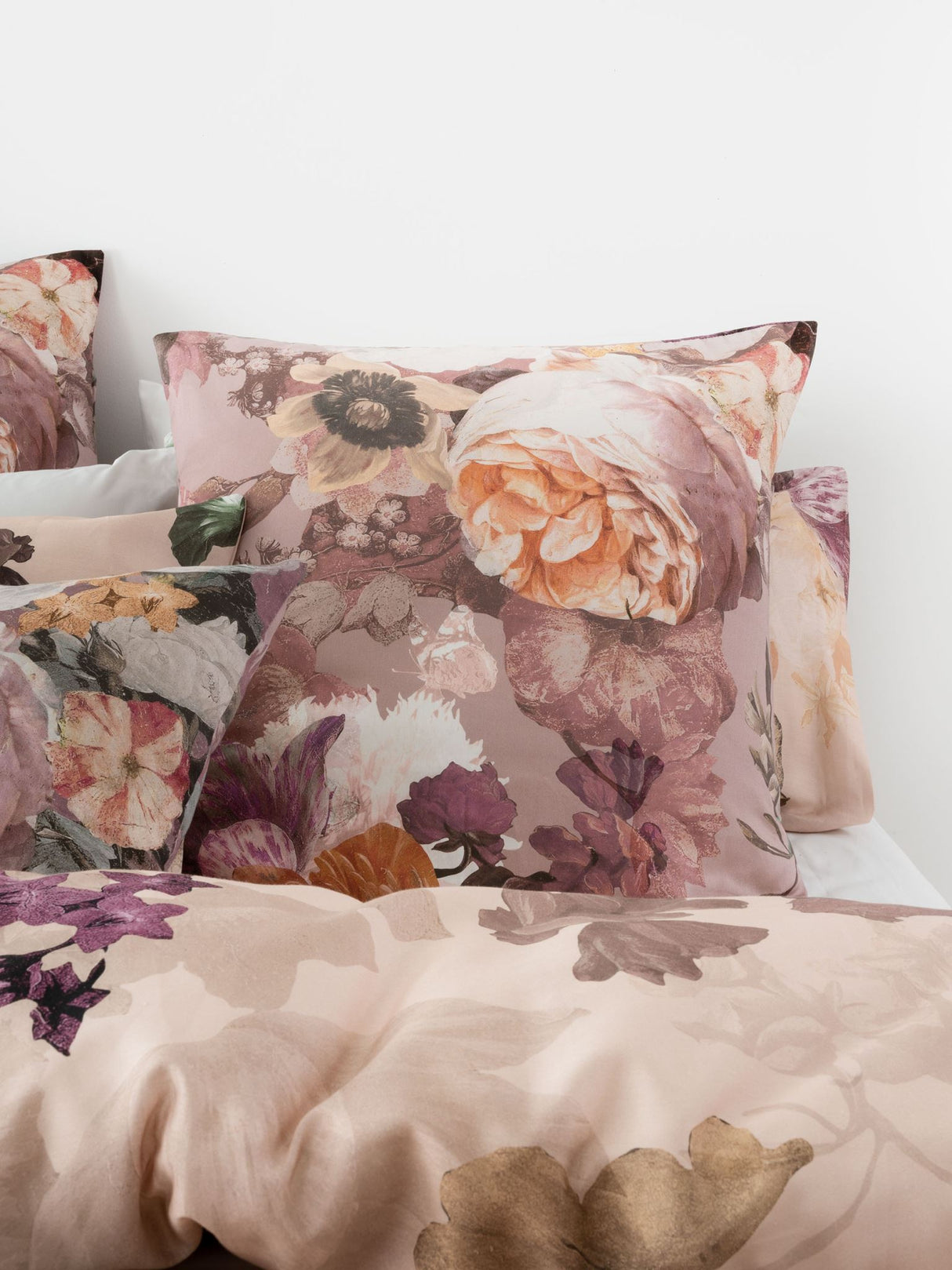 Rylee Queen Duvet Cover Set features vintage floral design on blush base, made from luxurious 100% cotton sateen.