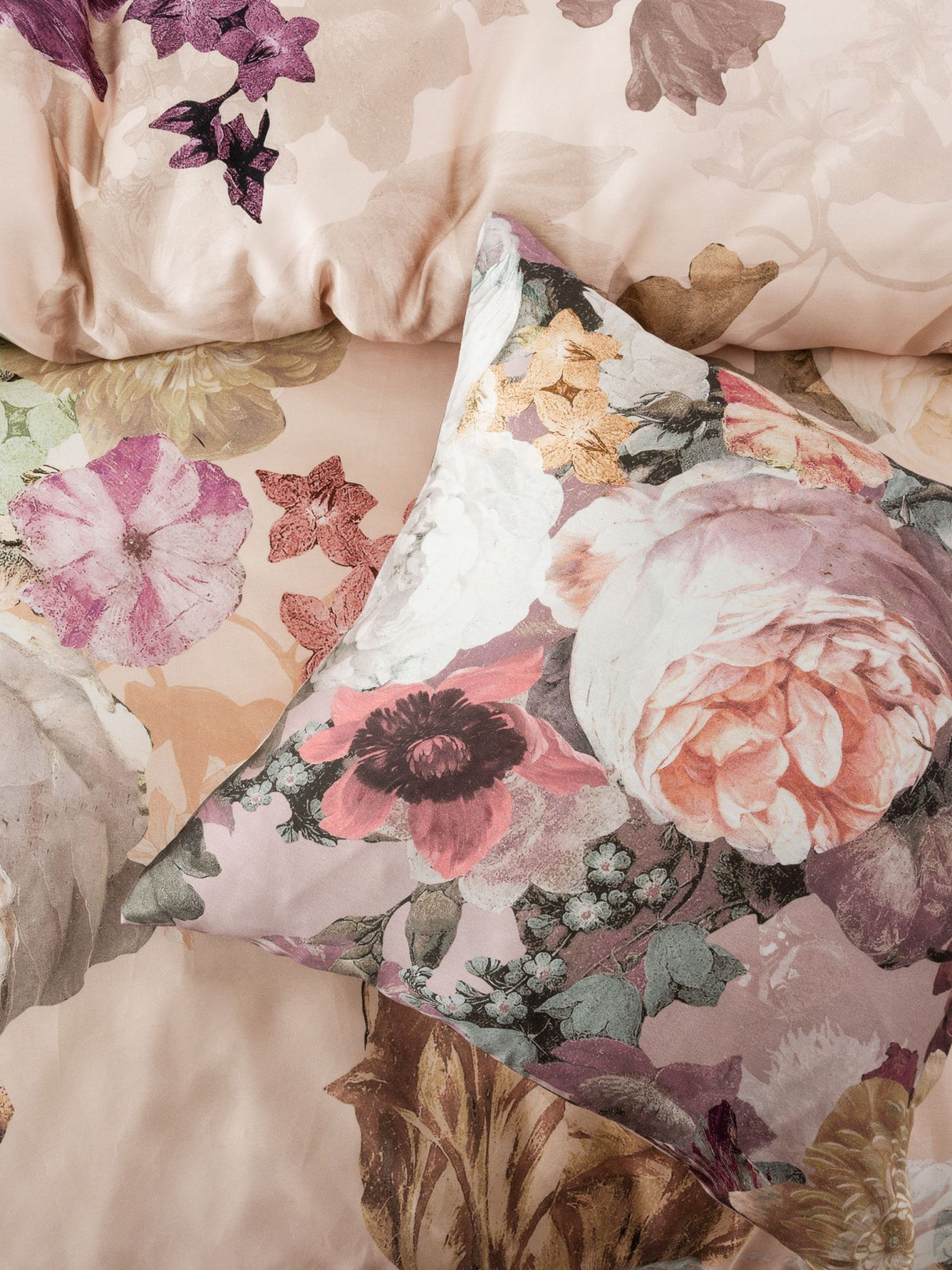 Rylee Queen Duvet Cover Set by SAVONA featuring vintage floral design on blush cotton sateen for luxurious bedroom decor.