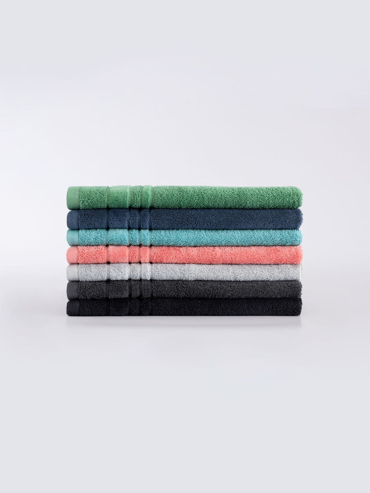 Selene Hand Towel in Denim, made from 550 GSM cotton, featuring a plush velour stripe for luxurious bathroom decor.