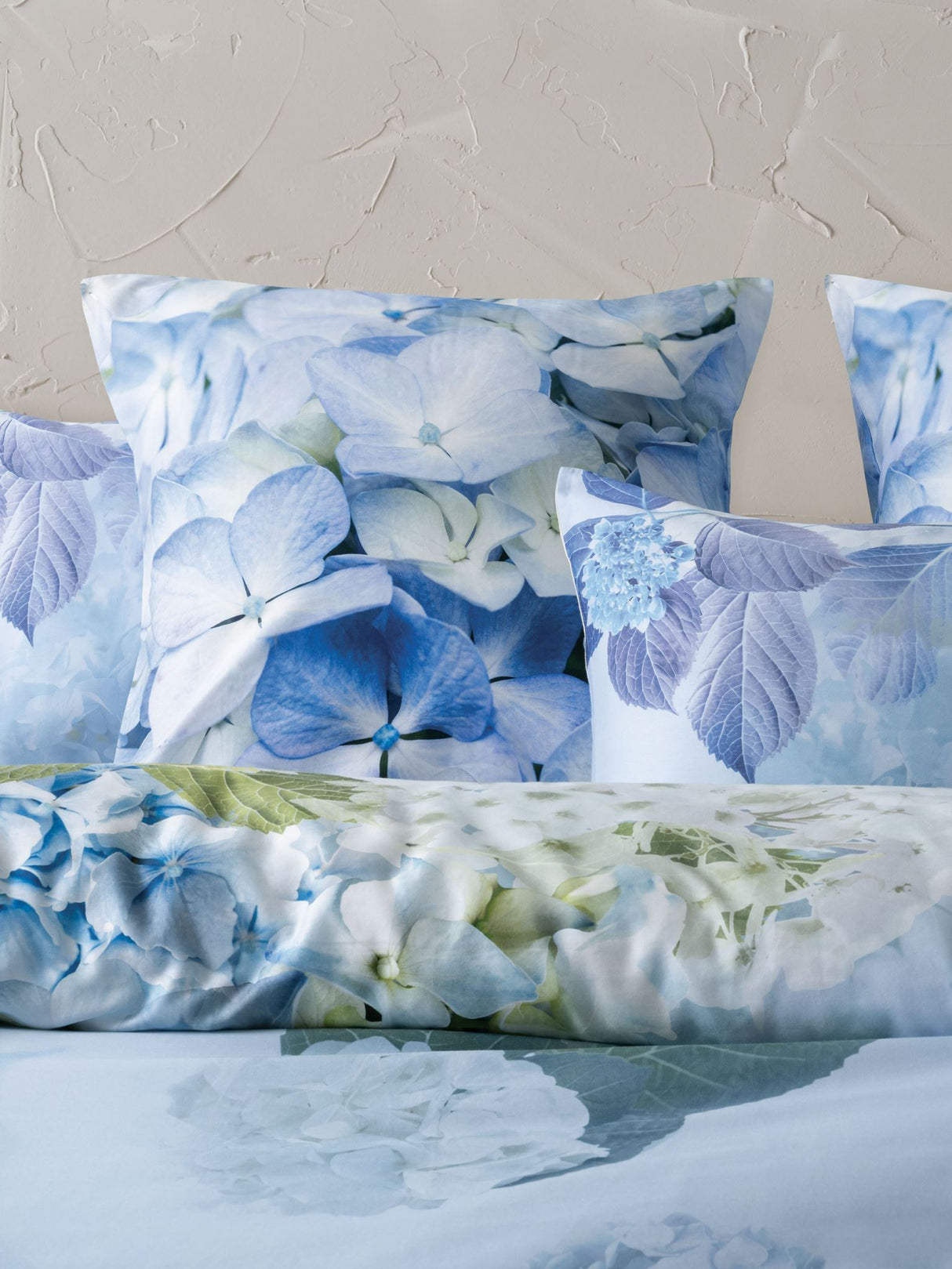 Thea Duvet Cover Set by Savona in sage, featuring a floral hydrangea pattern for Queen beds, made from soft cotton sateen.