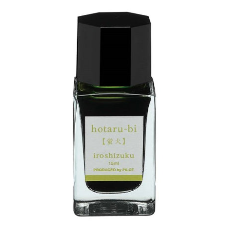 Vibrant 15ml Pilot Iroshizuku Hotaru-bi ink in a glass bottle, inspired by glowing fireflies, perfect for fountain pen use.