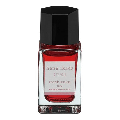 15ml bottle of Pilot Iroshizuku Cherry Blossom Petals ink, featuring vibrant pink hue and elegant glass design.