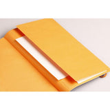 Rhodiarama A5 Dotted Notebook in Purple with soft cover, 160 bleed-proof pages, orange elastic closure, and inner pocket.