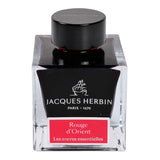 50ml bottle of Jacques Herbin Rouge d'Orient red fountain pen ink, known for its vibrant color and smooth fluidity.