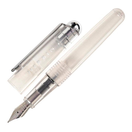 Herbin Transparent Fountain Pen with a sleek clear body, medium nib, and visible ink levels, perfect for all writing styles.