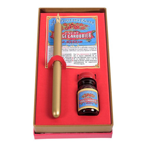 Herbin Traditional Writing Set featuring a red ink bottle, pen holder, and nib, elegantly presented in a gift box.