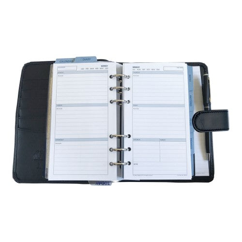 Debden Personal Dayplanner in black with snap closure, featuring undated layouts, storage pocket, and 6-ring binder for organization.