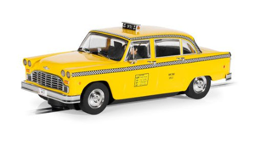 1977 NYC Taxi slot car in iconic yellow, featuring detailed design and compatibility with Scalextric digital systems.