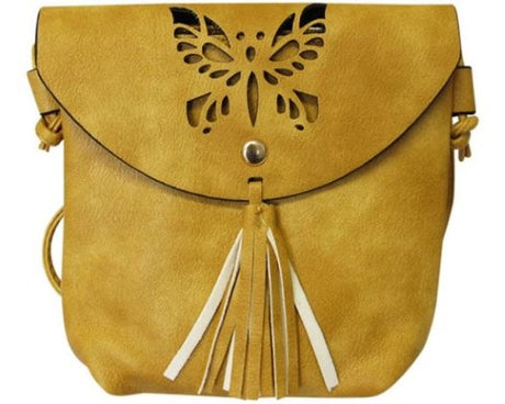 Mustard leather-look shoulder bag with cut-out butterfly design, tassel, zip top, and outer pocket for easy access.