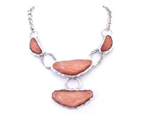 Matt silver necklace with vibrant coral accents, perfect for casual or formal occasions.