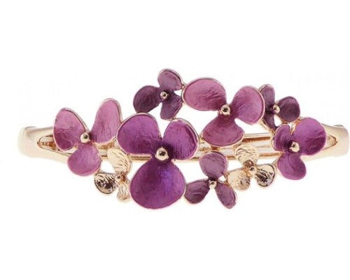 Rose gold bracelet with vibrant fuchsia flowers, perfect for adding color and elegance to any outfit.