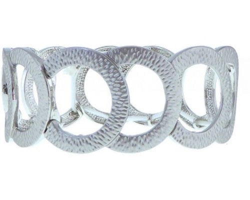 Elegant elasticated bracelet with textured circles in matt silver, perfect for both casual and formal occasions.