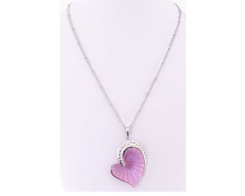 Fuchsia asymmetrical heart necklace with bold pendant, perfect for any occasion and adds a pop of color to outfits.