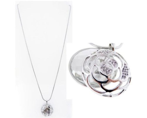 Elegant necklace featuring a 4.5cm faceted clear crystal pendant and delicate silver rose accent, on an 80cm chain.