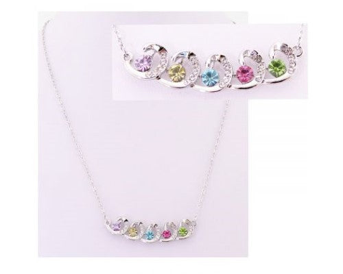Stunning silver necklace with heart design, featuring vibrant multi-coloured crystals, perfect for any occasion.
