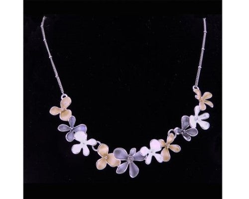 Rhodium plated silver necklace featuring delicate small flowers, perfect for adding elegance to any outfit.
