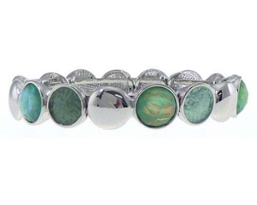 Silver bracelet with dark and light green circles, featuring a modern magnet fastening, ideal for any occasion.