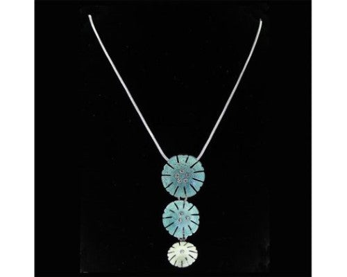 Elegant necklace featuring three floral pendants in light green and aqua, embellished with sparkling diamante accents.