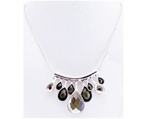 Stunning teardrop necklace featuring clear crystals and black enamel accents, perfect for elevating any outfit.