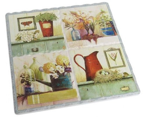 Elegant cork-backed ceramic trivet with vibrant Jardin floral design, measuring 15.5 cm x 16 cm for heat protection.