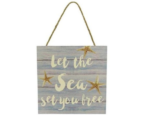 Wooden 'Let the sea set you free' sign with rope hanger, perfect for beach houses, measuring 15 x 15 cm.