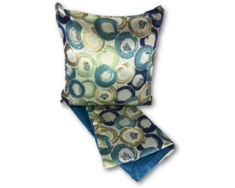 Decorative blue cushion cover with playful circle pattern, featuring easy zip access for washing, measuring 44cm x 44cm.