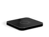 Hahnel PowerCube wireless charger for charging cameras and mobile devices, featuring 9V fast charge and compact design.
