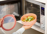 Cirqula Round 3-Piece Set in Nordic Sage, durable and stackable food storage bowls with airtight lids and transparent windows.