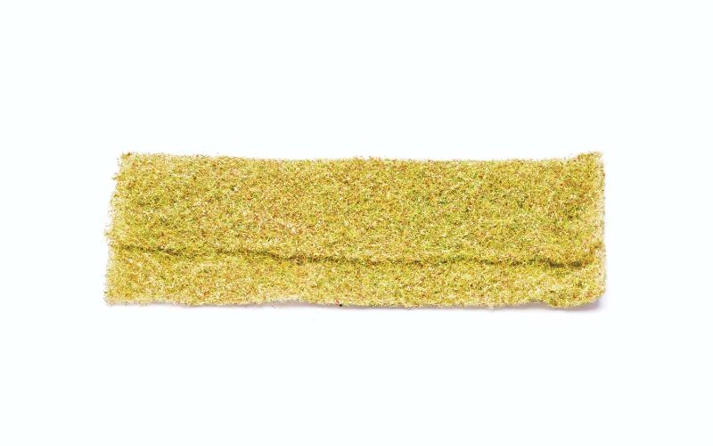 Lifelike Hornby Foliage in yellow and green, perfect for adding a sunlit meadow effect to model railways and dioramas.