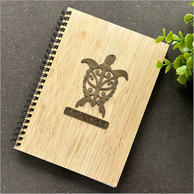 Elegant Bamboo Journal in Turtle River Rimu with 110 pages of high-quality cartridge paper for creative writing and sketching.