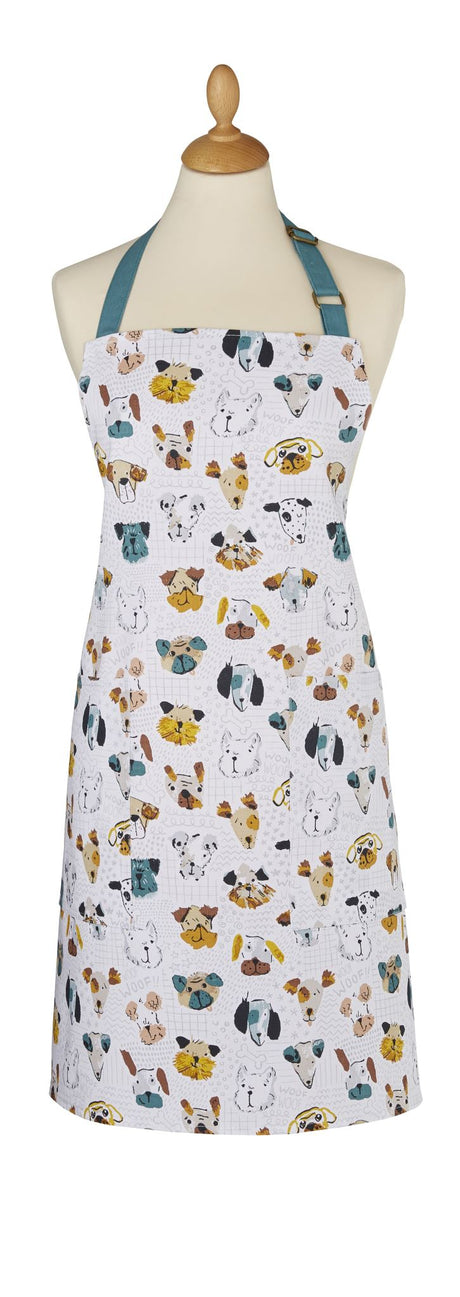 Colorful Ulster Weavers cotton apron featuring the playful Mutley Crew design, perfect for stylish cooking and baking.
