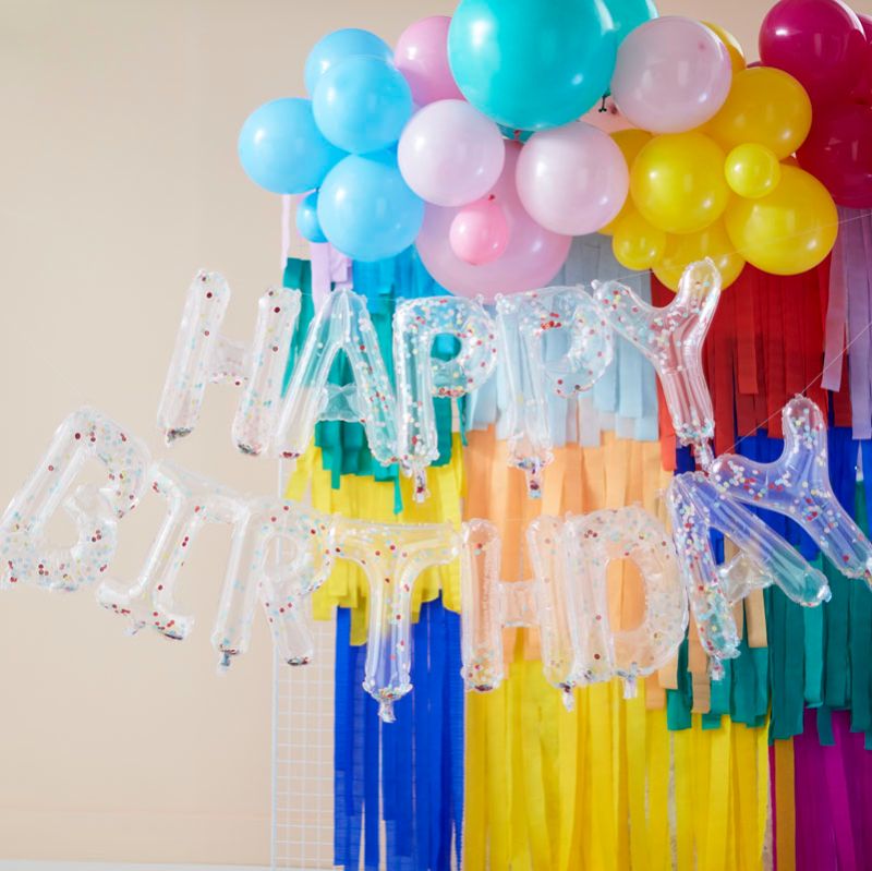 Vibrant rainbow confetti Happy Birthday balloon bunting, perfect for festive celebrations with easy inflation and colorful design.