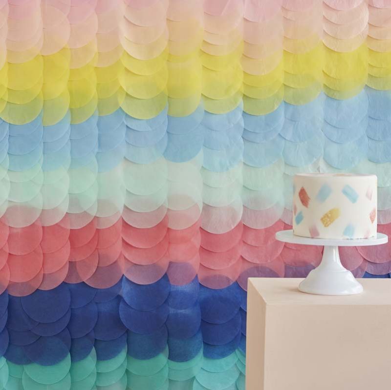 Vibrant rainbow tissue paper disc backdrop, 200cm x 200cm, perfect for festive celebrations and photo booths.